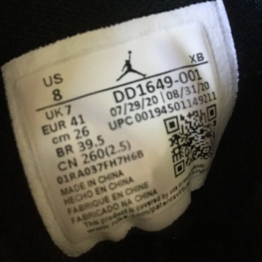 Jordan Black and White High-Top Sneakers